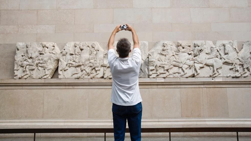 Man taking photos at British Museum